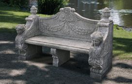 Ω A CARVED LIMESTONE GARDEN SEAT IN ITALIAN CLASSICAL TASTE