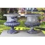 ‡ A PAIR OF FRENCH BLUE ENAMELLED CAST IRON PLANTERS