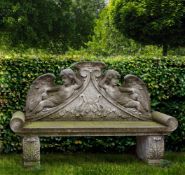 Ω A CARVED LIMESTONE GARDEN BENCH IN LOUIS XVI STYLE