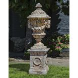 Ω A COMPOSITION STONE GARDEN URN IN 18TH CENTURY TASTE