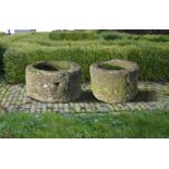 ‡ TWO SIMILAR GRITSTONE PLANTERS