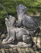 Ω A PAIR OF SCULPTED LIMESTONE MODELS OF SEATED FROGS