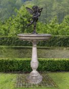 ‡ A FLORENTINE CARVED MARBLE AND BRONZE MOUNTED FOUNTAIN
