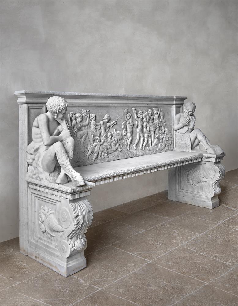 ‡ A RARE AND IMPRESSIVE SCULPTED AND CARVED WHITE MARBLE NEOCLASSICAL BENCH