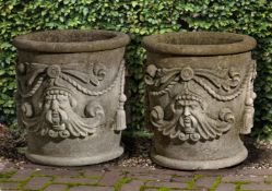 Ω A PAIR OF CARVED LIMESTONE PLANTERS