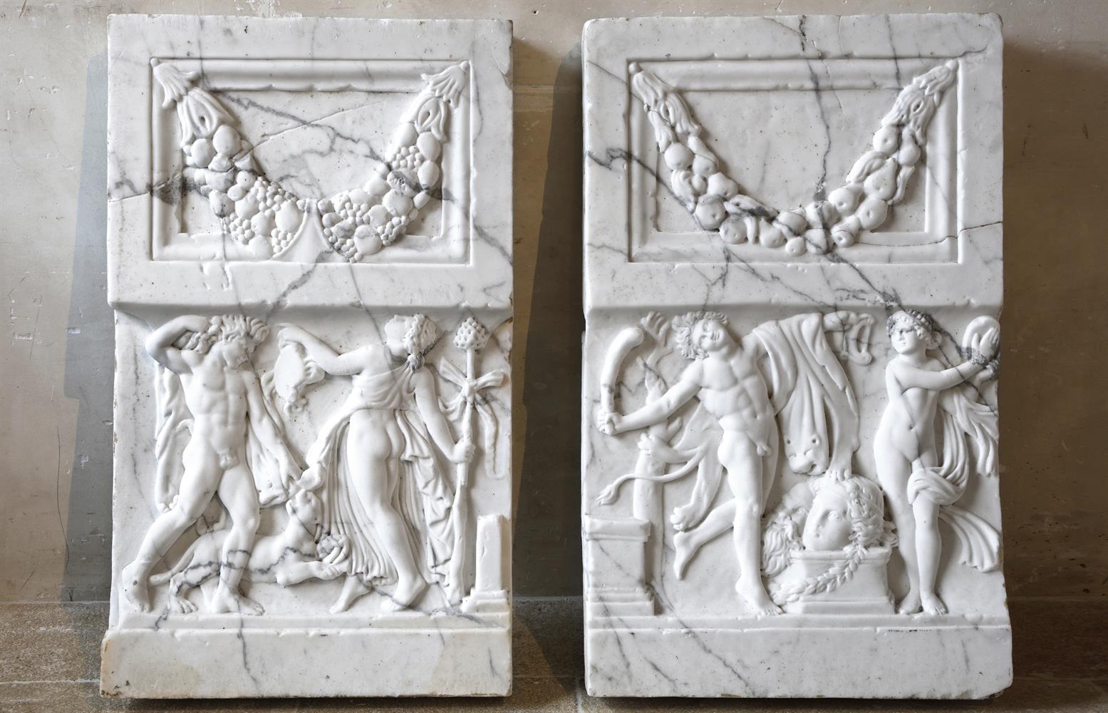 ‡ A PAIR OF CARVED WHITE MARBLE RELIEF FRIEZE PANELS