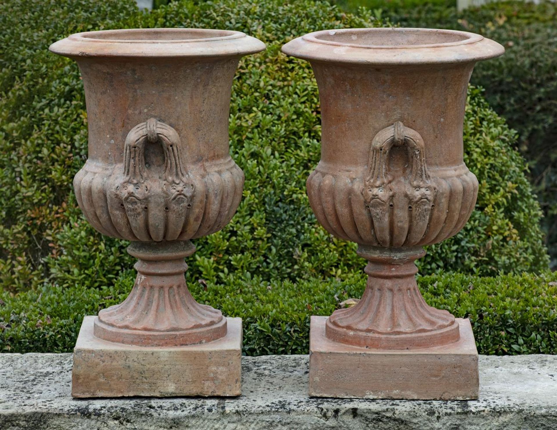 ‡ A PAIR OF TERRACOTTA VASES