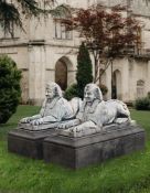 Ω A PAIR OF SCULPTED MARBLE MODELS OF EGYPTIAN SPHINGES (SPHINXES)