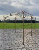 ‡ A CAST AND WROUGHT IRON GARDEN ARBOUR OR ROSE PERGOLA