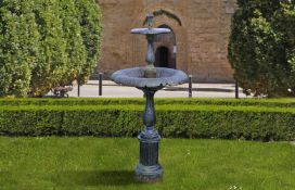 ‡ A CAST IRON TWO TIER BLACK PAINTED FOUNTAIN