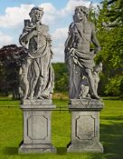 Ω A PAIR OF SCULPTED LIMESTONE GARDEN FIGURE OF APOLLO AND DIANA