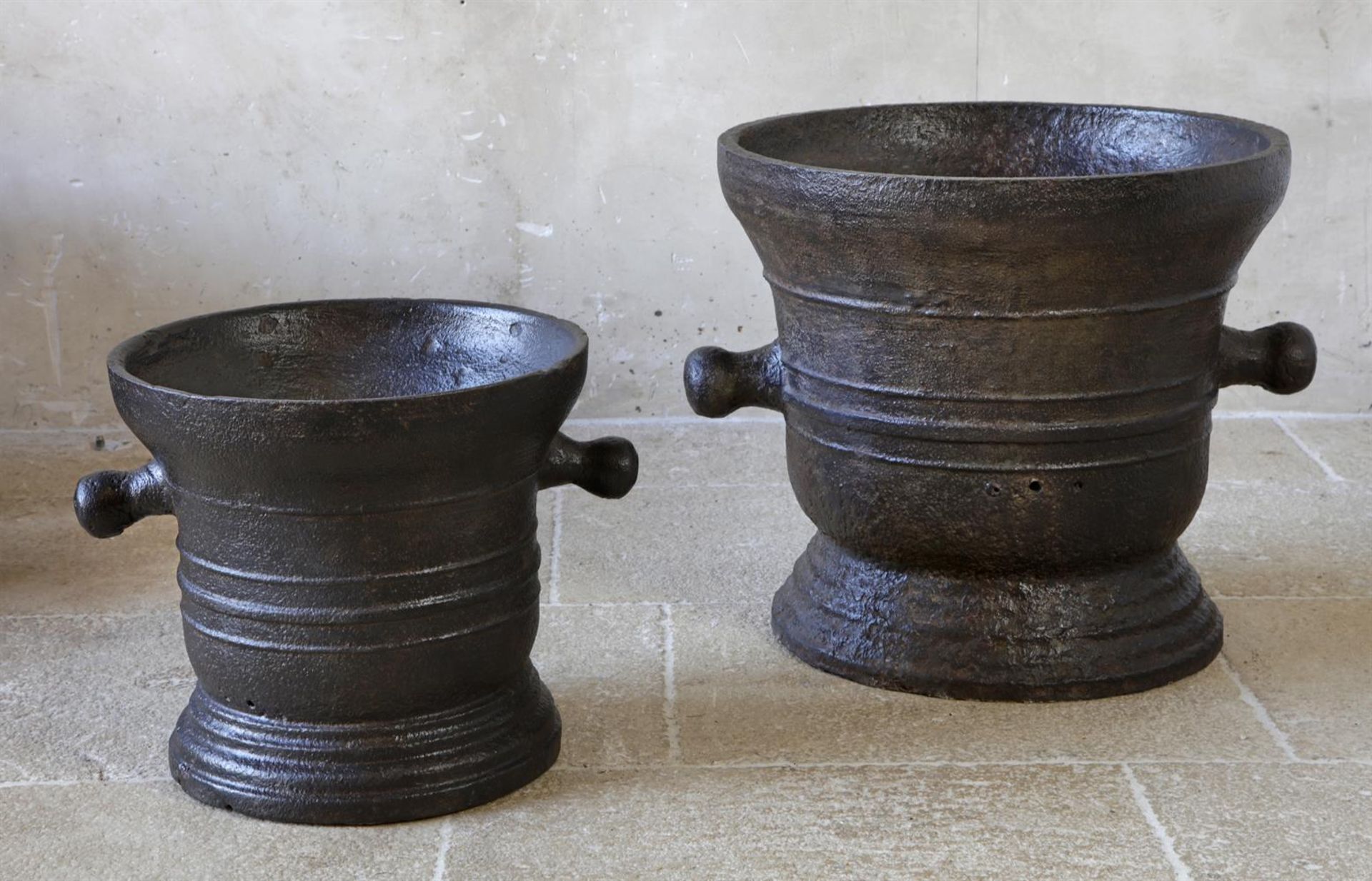 ‡ TWO SUBSTANTIAL CAST IRON MORTARS