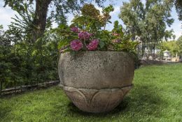 Ω A CARVED LIMESTONE PLANTER