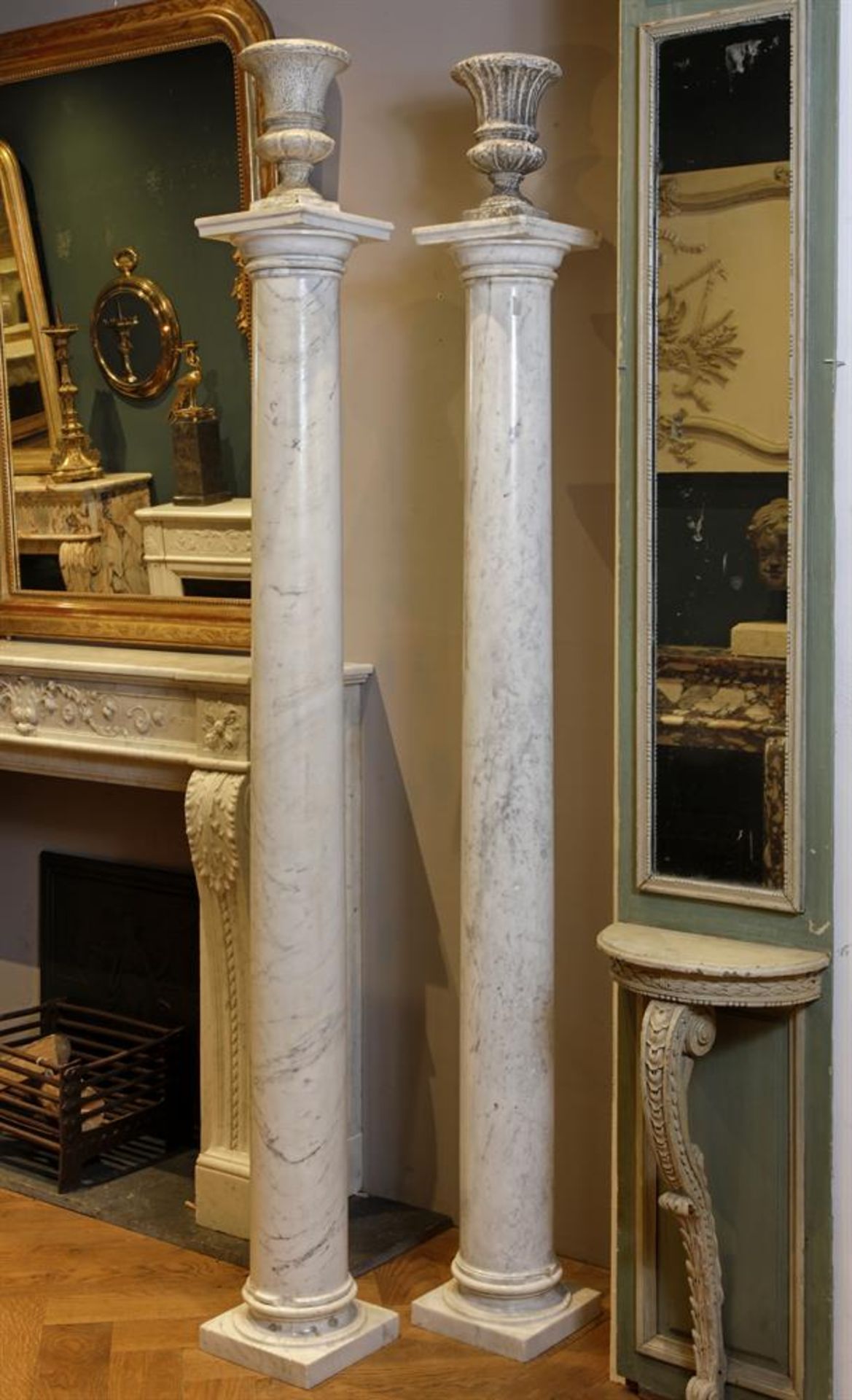 ‡ A PAIR OF VARIEGATED WHITE MARBLE COLUMNS