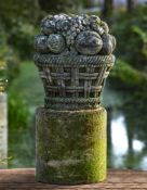 ‡ A FRENCH CARVED LIMESTONE FRUIT BASKET