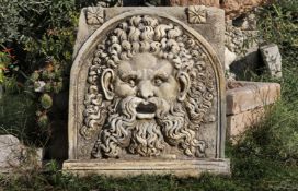 Ω A SUBSTANTIAL SCULPTED MARBLE WALL FOUNTAIN MASK