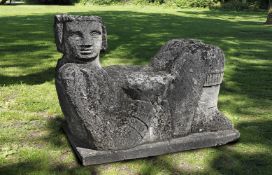 ‡ A CARVED LIMESTONE FIGURAL GARDEN SEAT IN THE MESOAMERICAN STYLE