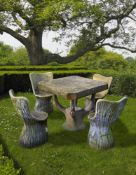 ‡ A SUITE OF COMPOSITION STONE 'FAUX BOIS' GARDEN FURNITURE