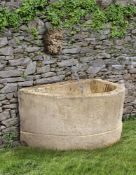 ‡ A FRENCH CARVED PIERRE DE BOURGOGNE LIMESTONE BASIN