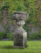 Ω A CARVED LIMESTONE PLANTER