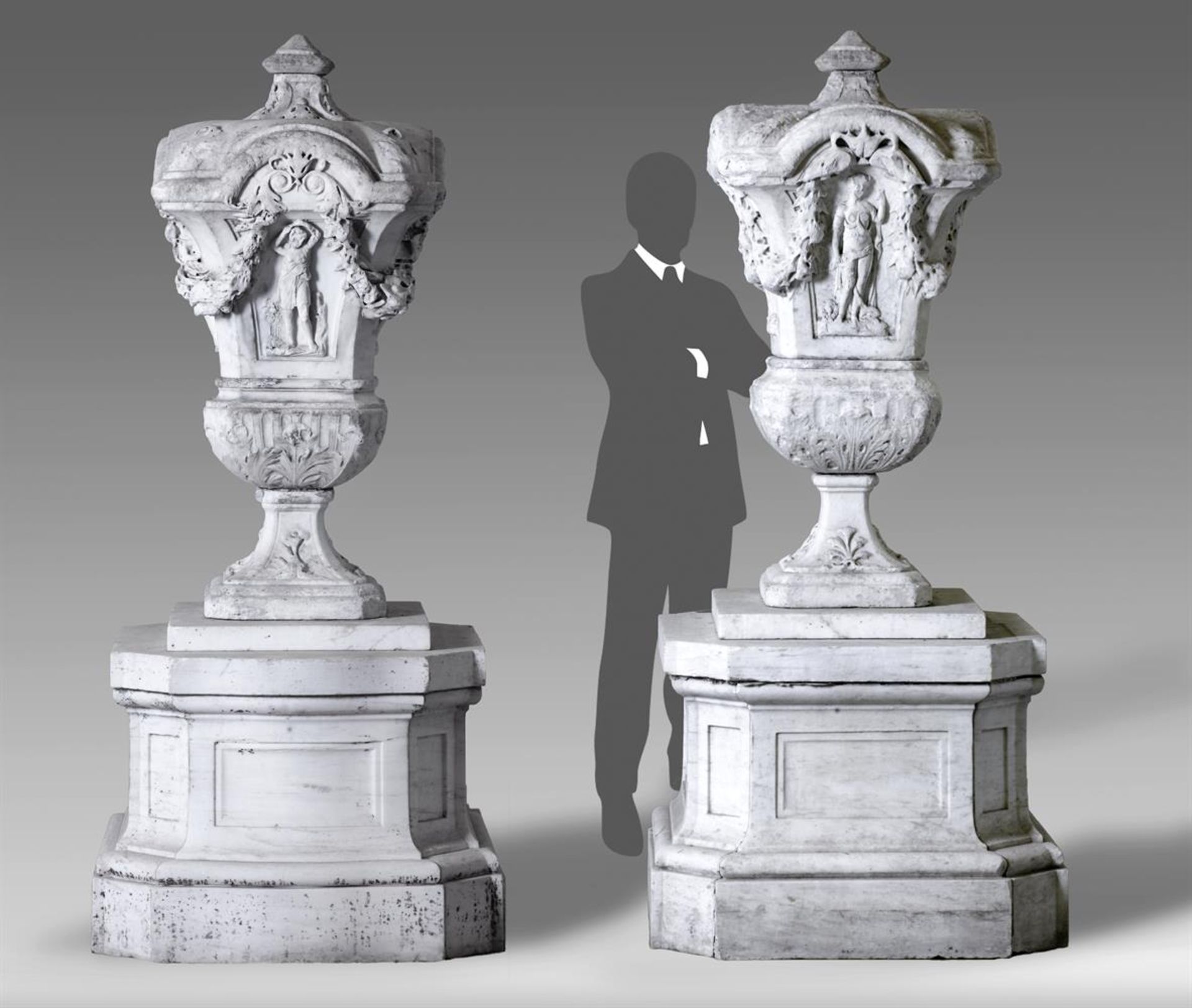 ‡ A PAIR OF MAGNIFICENT ITALIAN SCULPTED WHITE MARBLE URNS