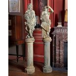 ‡ A PAIR OF TERRACOTTA FIGURES, EMBLEMATIC OF SUMMER AND WINTER