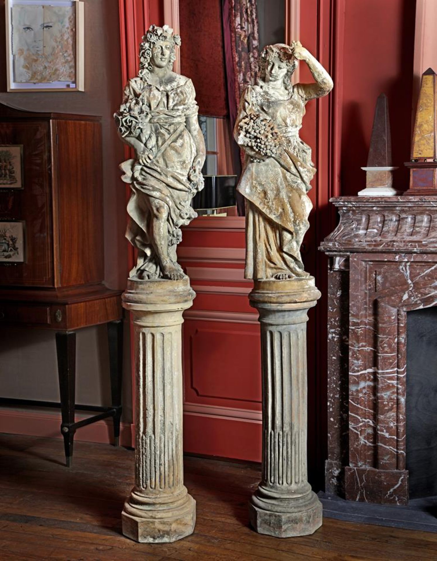 ‡ A PAIR OF TERRACOTTA FIGURES, EMBLEMATIC OF SUMMER AND WINTER