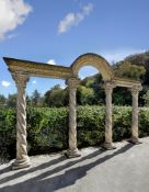 Ω A CARVED LIMESTONE ARCADE