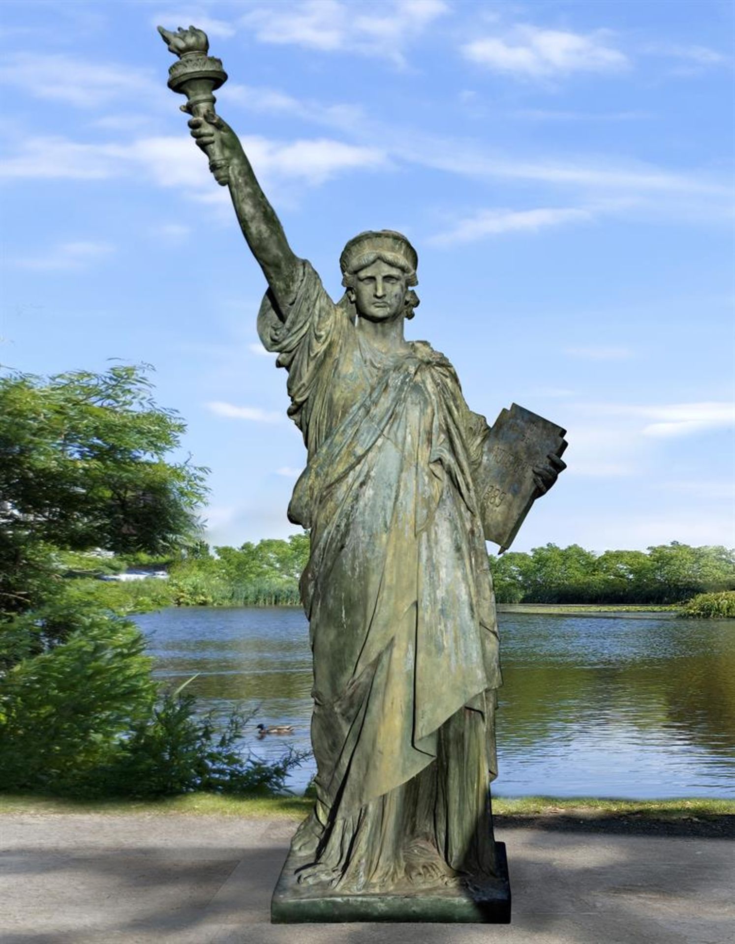 Ω AFTER FREDERIC AUGUSTE BARTHOLDI, A BRONZE COLOURED RESIN MODEL OF THE STATUE OF LIBERTY