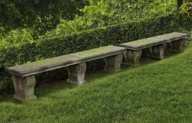 Ω A PAIR OF CONTINENTAL LIMESTONE GARDEN SEATS