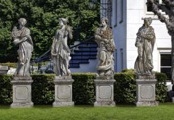 ‡ A SET OF FOUR SCULPTED LIMESTONE MODELS OF MAIDENS REPRESENTING THE FOUR SEASONS