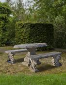 Ω A SUITE OF CARVED LIMESTONE GARDEN FURNITURE