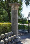 ‡ A CARVED LIMESTONE COLUMN