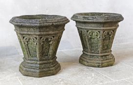 ‡ A PAIR OF CARVED SANDSTONE GARDEN PLANTERS IN GOTHIC REVIVAL TASTE