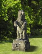 Ω A SCULPTED LIMESTONE MODEL OF A GRIZZLY BEAR