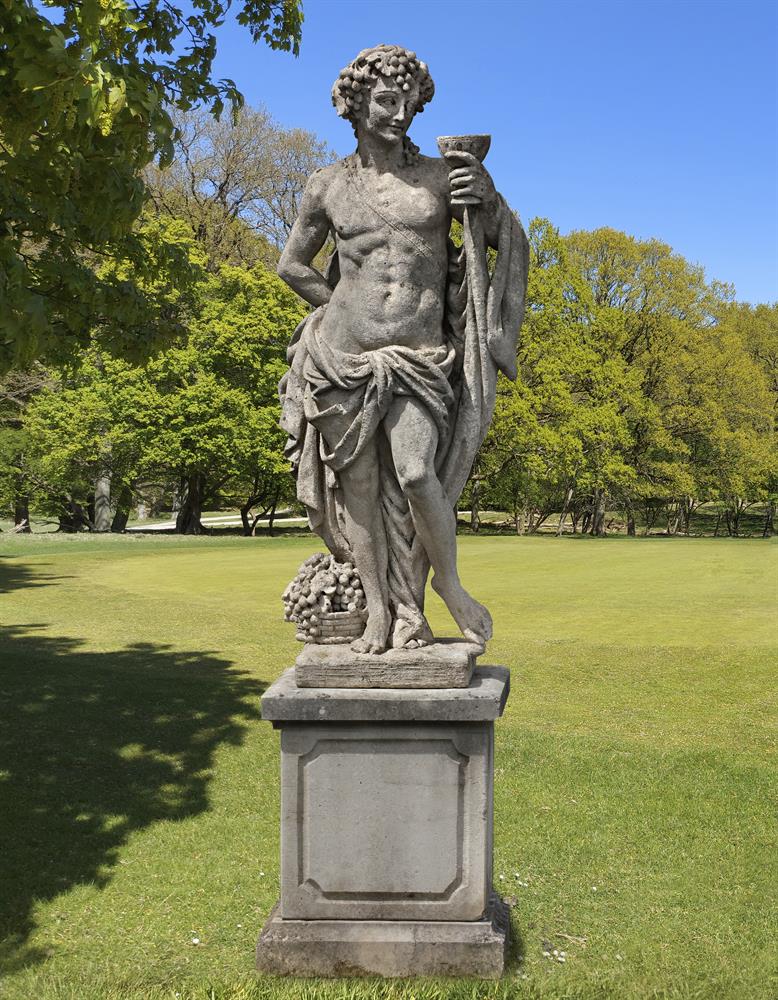 ‡ AFTER THOMAS REGNAUDIN (1622-1706), A CARVED LIMESTONE GARDEN FIGURE OF BACCHUS