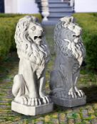 ‡ A PAIR OF ITALIAN SCULPTED WHITE MARBLE MODELS OF SEATED LIONS