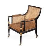 Y AN REGENCY EBONISED AND PARCEL GILT CANED BERGERE, EARLY 19TH CENTURY