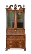A WALNUT AND PARCEL GILT BUREAU BOOKCASE, MID 18TH CENTURY AND LATER