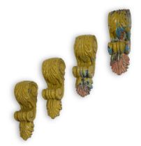 A SET OF FOUR TERRACOTTA CORBELS PROBABLY SECOND HALF 19TH CENTURY