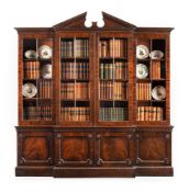 A MAHOGANY BREAKFRONT LIBRARY BOOKCASE CONSTRUCTED FROM 18TH CENTURY AND LATER ELEMENTS