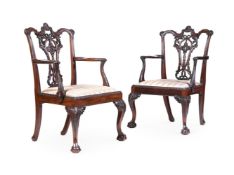 A PAIR OF CARVED MAHOGANY OPEN ARMCHAIRS, IN 18TH CENTURY