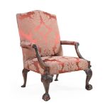 A MAHOGANY GAINSBOROUGH ARMCHAIR IN GEORGE II STYLE, LATE 19TH/EARLY 20TH CENTURY