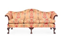 A CARVED WALNUT AND UPHOLSTERED SOFA IN GEORGE III STYLE, 20TH CENTURY