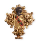 A FLORENTINE CARVED GILTWOOD ARMORIAL CARTOUCHE 18TH CENTURY