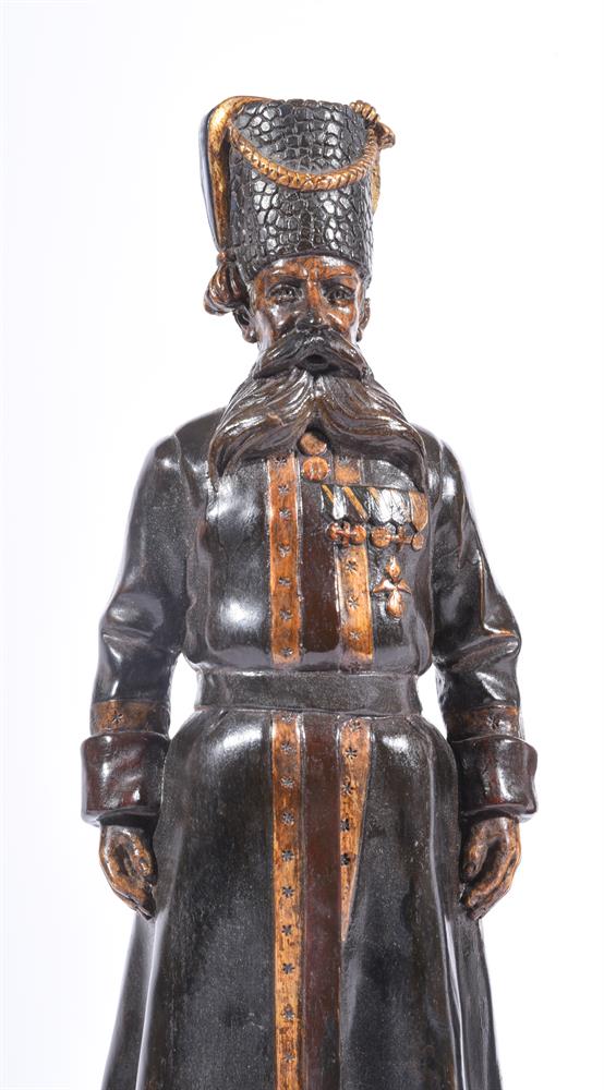 A PAIR OF RUSSIAN BRONZED AND GILT METAL MODELS OF COSSACK SOLDIERS - Image 2 of 3