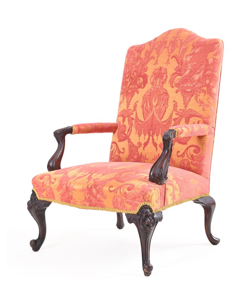 A CONTINENTAL MAHOGANY GAINSBOROUGH ARMCHAIR, MID 18TH CENTURY AND LATER