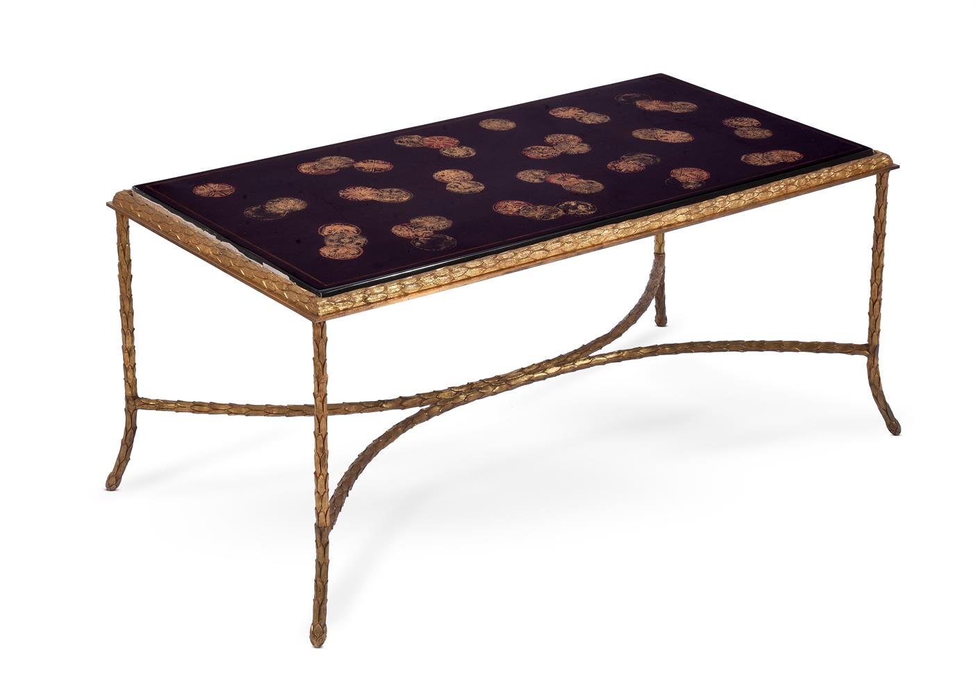 A GILT METAL AND JAPANNED RECTANGULAR LOW TABLE