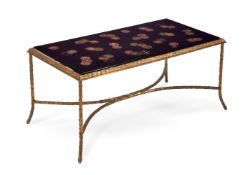 A GILT METAL AND JAPANNED RECTANGULAR LOW TABLE