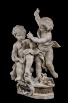 A CARVED WHITE ALABASTER FIGURAL GROUP OF TWO PUTTI 18TH/19TH CENTURY